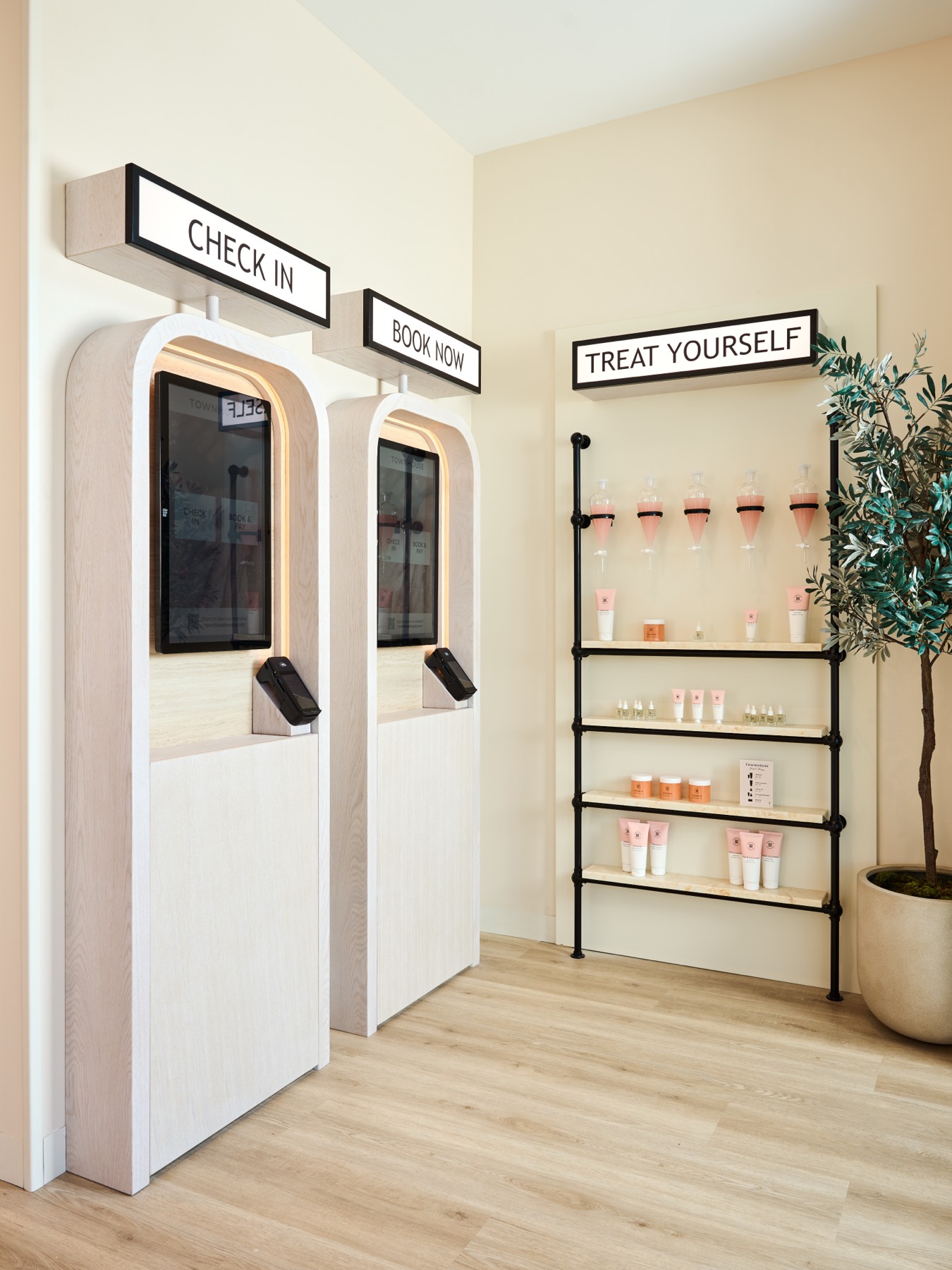 Pavilion Flow kiosks beside the retail shelf